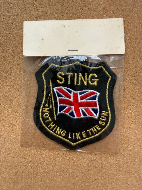 Sting "...Nothing Like the Sun" Embroidered Patch — Vintage 1987 Design, Unopened (approx. 8 × 9.5 cm)