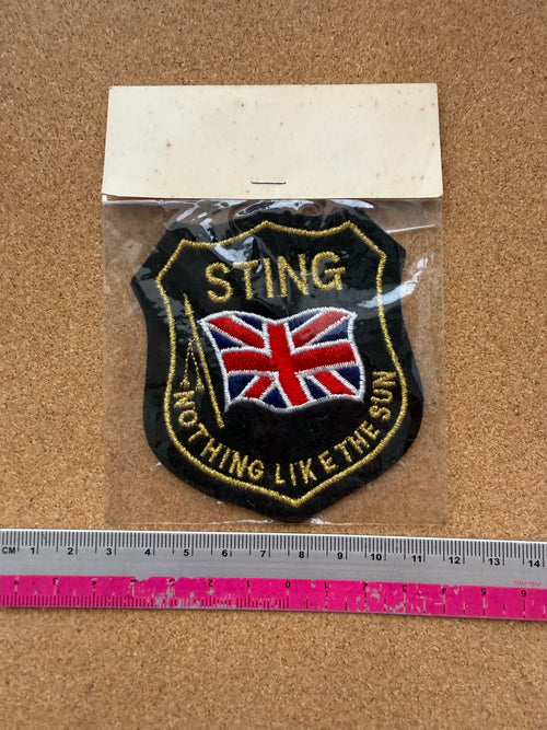 Sting "...Nothing Like the Sun" Embroidered Patch — Vintage 1987 Design, Unopened (approx. 8 × 9.5 cm)