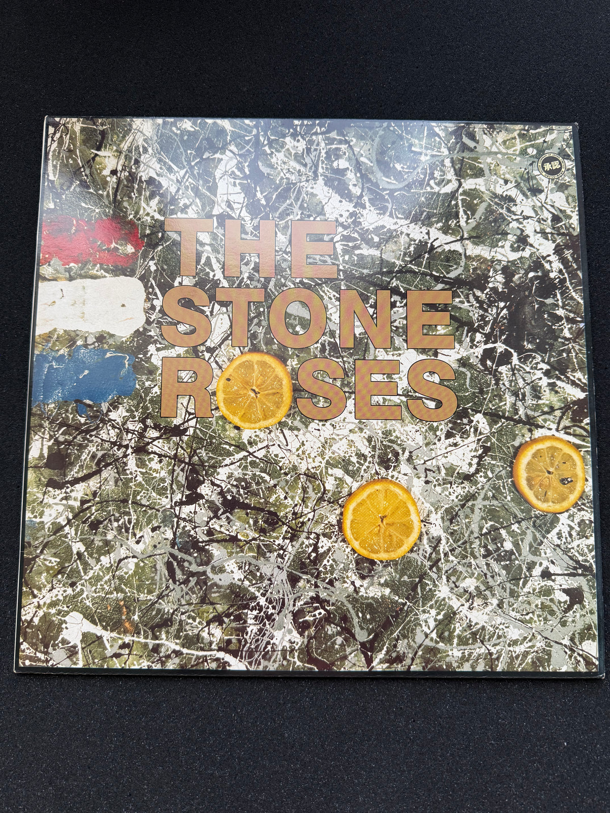 Back sleeve of The Stone Roses debut LP, UK Silvertone first pressing
